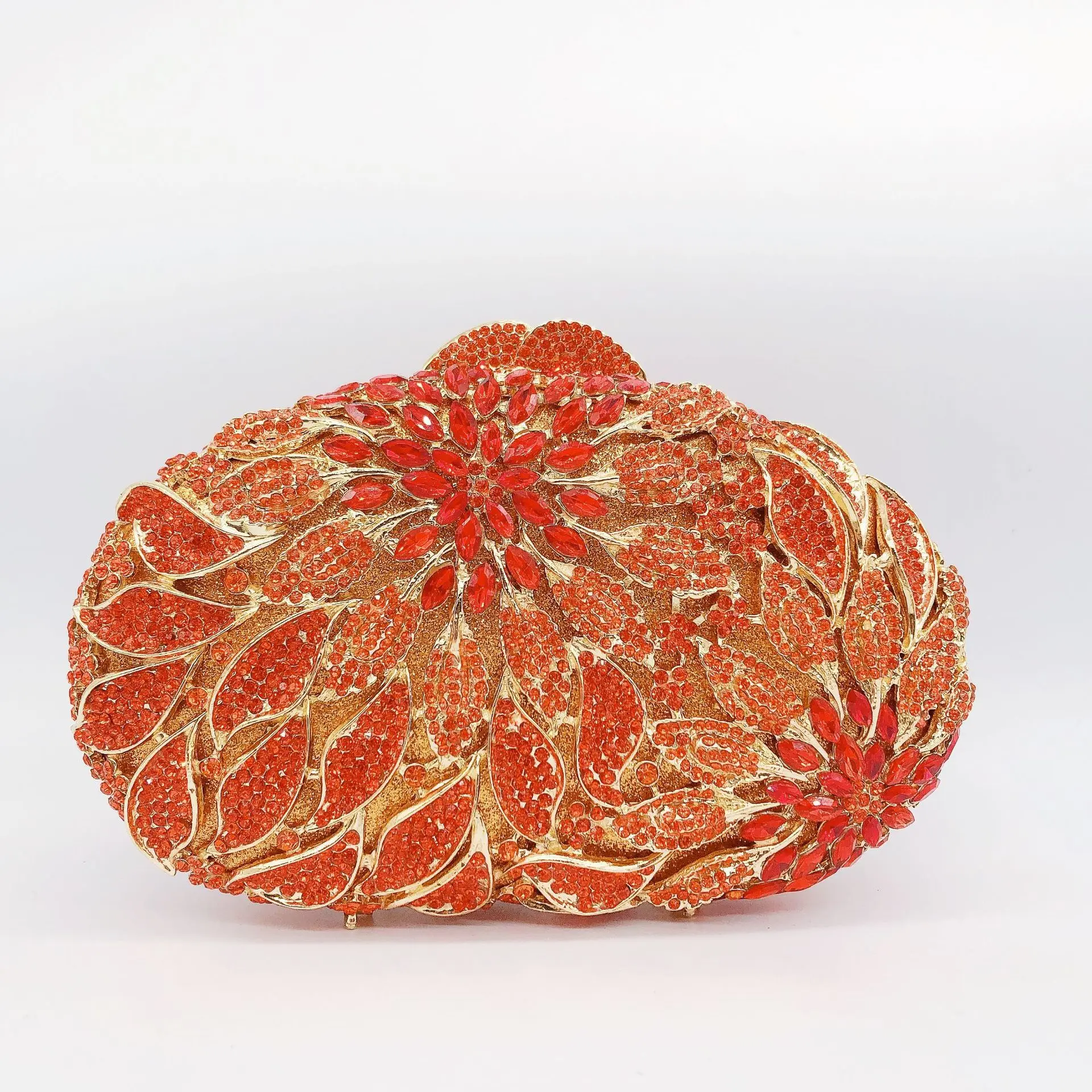 MC Gold Metal Leaves Evening Clutch Bag features exquisite white crystals and rhinestone embellishments,